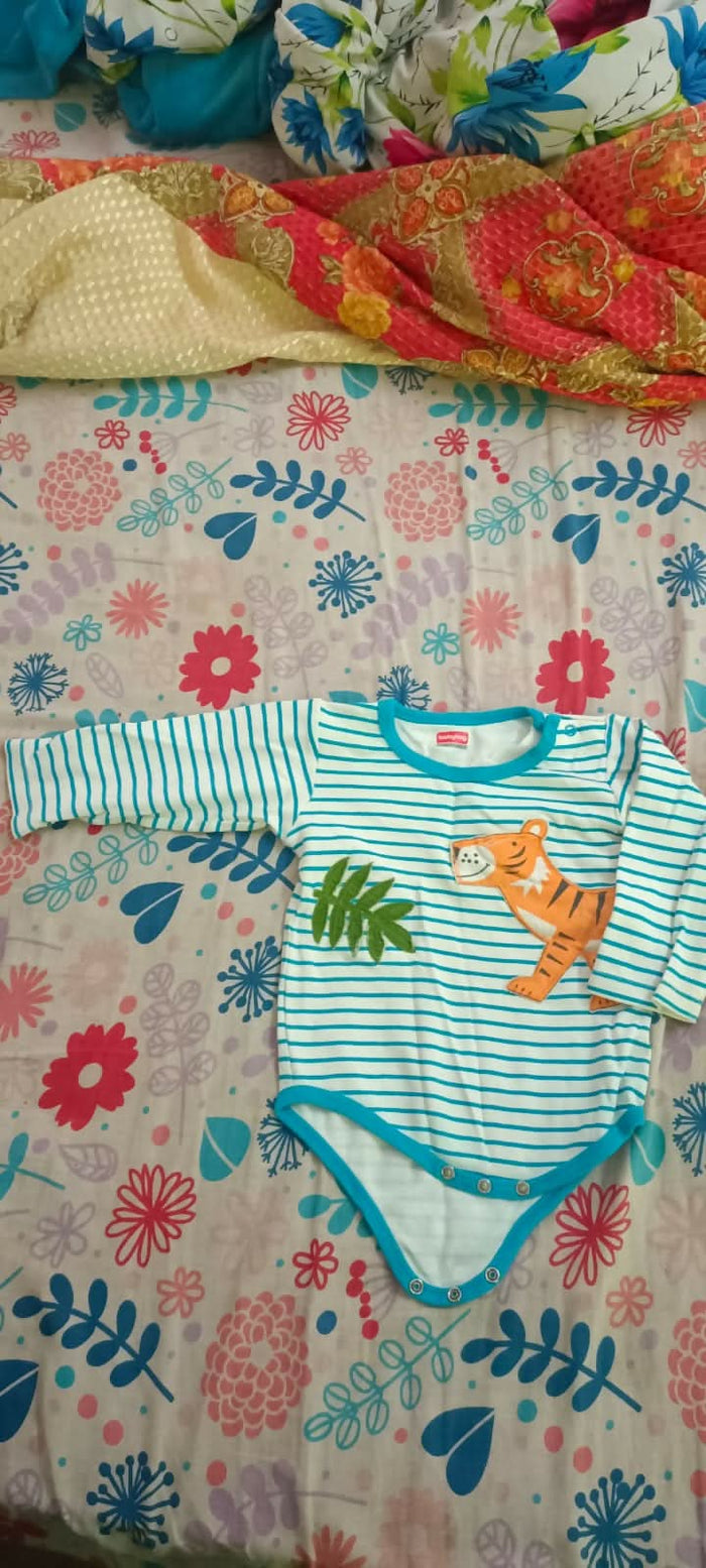 Keep your baby cozy and comfortable with the Babyhug Full Sleeves Onesie—soft, breathable, and perfect for everyday wear!