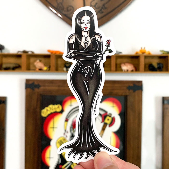American Traditional tattoo flash illustration Morticia Addams Cara Mia pinup watercolor sticker.