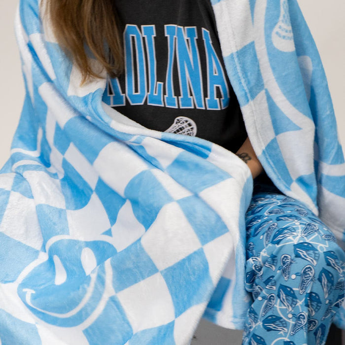 blue smiley checkerboard blanket