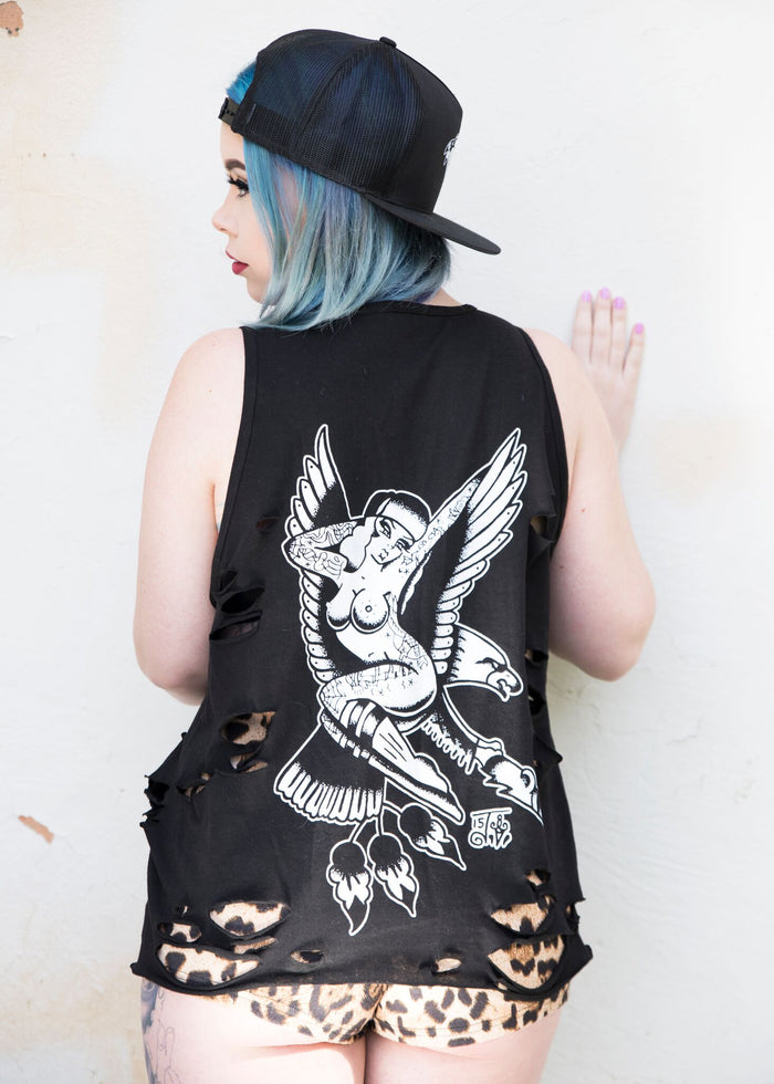 Female model wearing a tattoo style eagle and pinup tank top.