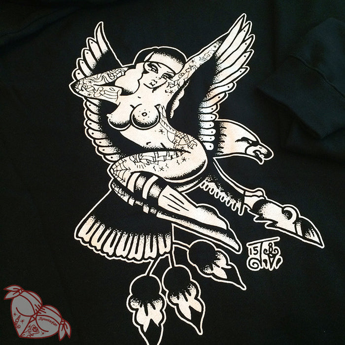 Tattoo style eagle and pinup on black mens hoodie close up.