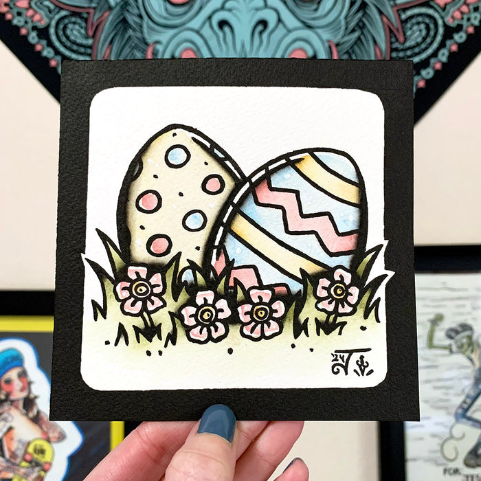 American traditional tattoo flash illustration Easter Eggs in grass and flowers watercolor painting.