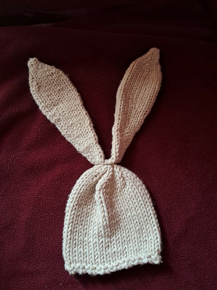 Knitted beige bunny hat with ears