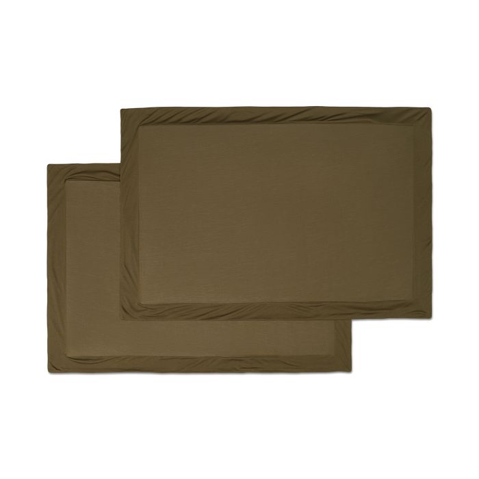 A set of forest green jersey knit sham pillowcases with a flange border flatlay image