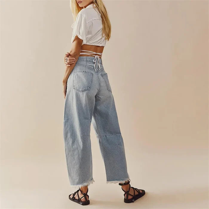 L'AURABLEND HIGH-RISE FLARED DENIM JEANS