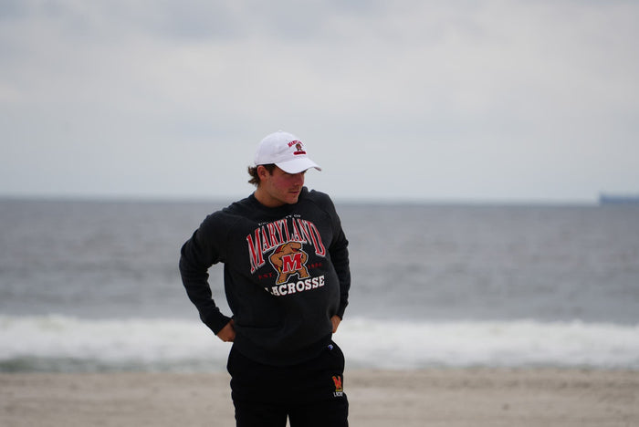 Maryland Lacrosse Crew neck on model at the beach