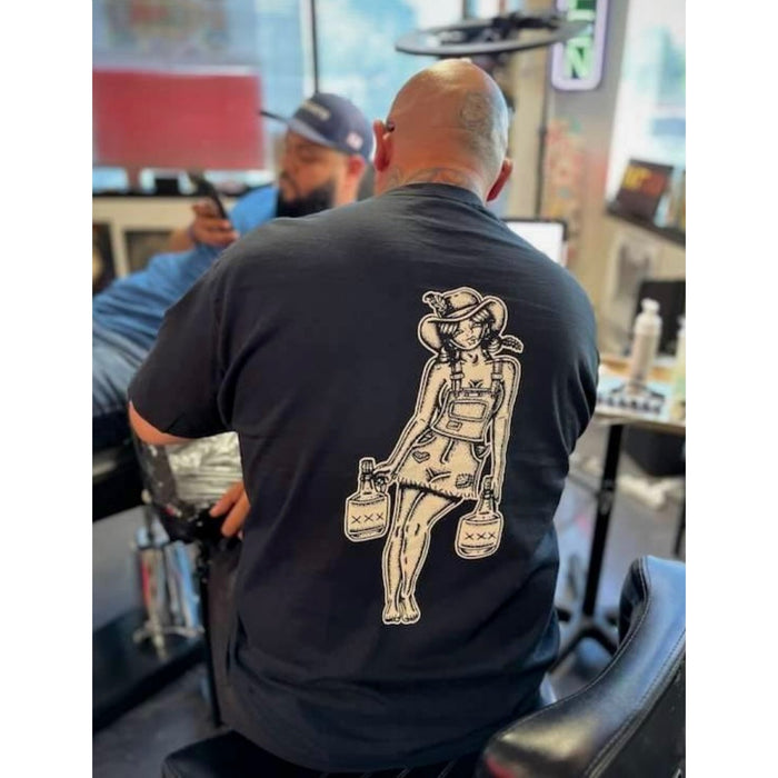 American traditional tattoo flash Moonshiner pinup tee.