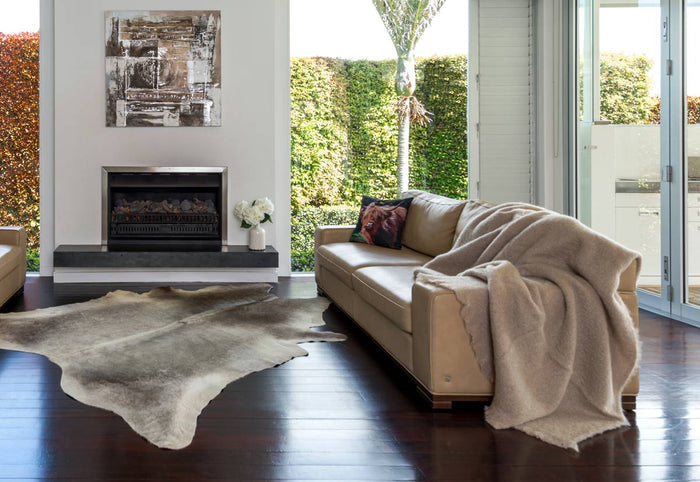 A Beige Mohair Blanket on a sofa