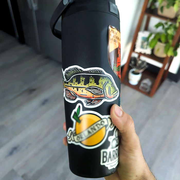 American traditional tattoo flash Peacock Bass watercolor sticker on water bottle.